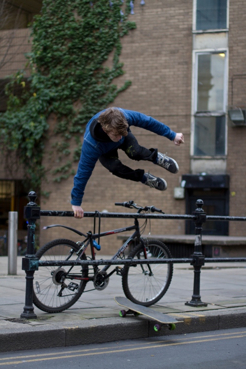 Paddy Gomulski - hand assisted hippy jump (over a bike)
